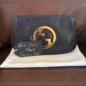 Gucci Black and Gold Clutch